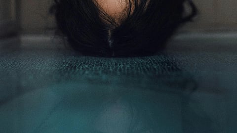 Image of a head in upside down position.