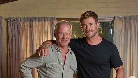 Image of Chris with his father.