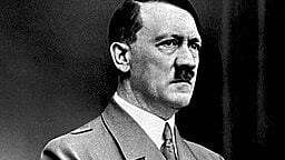 Black and white image of Adolf Hitler in a suit.