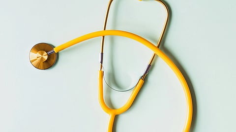 Image of a stethoscope in yellow color.