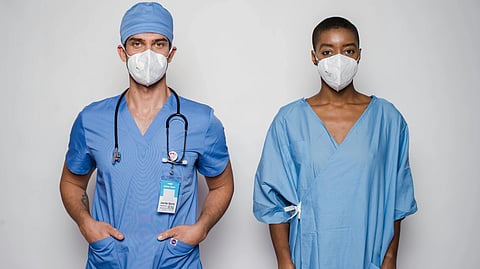 An image of a male nurse and female nurse.