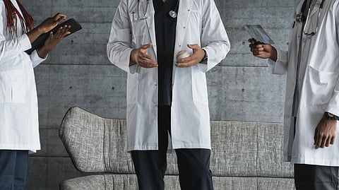 An image of 3 doctors.