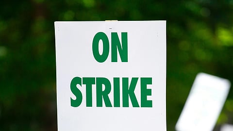 An image of an on strike poster.