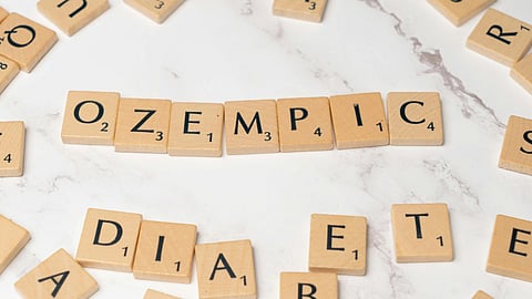 Image of wooden blocks having 'OZEMPIC' written over them.