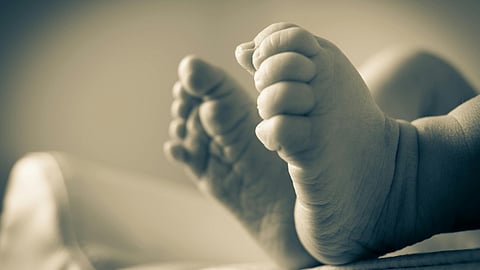 An image of a baby’s feet.