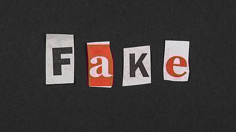 An image of letters spelling fake.