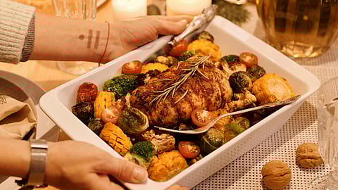 An image of christmas dinner of chicken.