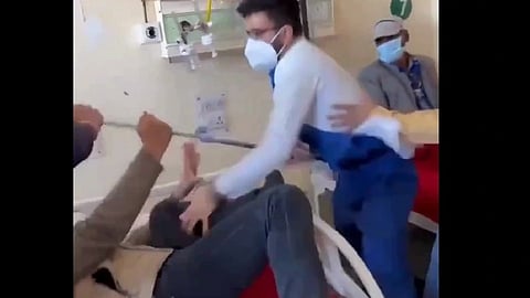 The doctor is seen assaulting the patient. 