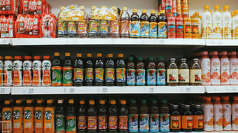 An image of beverages on shelves.