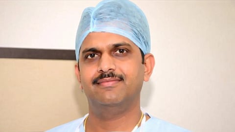 A portrait of Dr. Chandrashekhar Pakhmode.