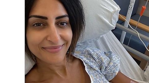 Image of Dr. Punam Krishan in a hospital gown.