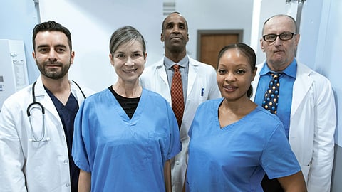 An image of 2 nurses and doctors.