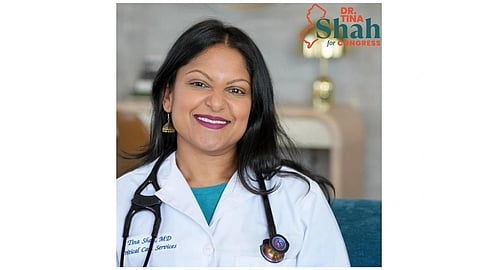 An image of smiling woman in a white coat with a stethoscope, sitting against a blurred background. Logo above reads "Dr. Tina Shah for Congress."