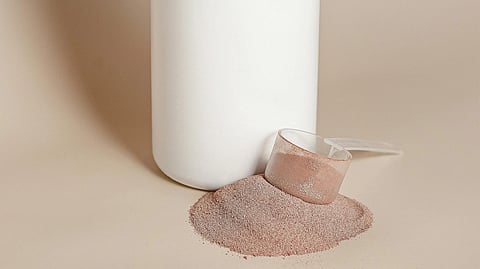 Image of a scoop of protein powder.