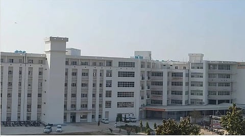 White-colored building of Al Falah University campus in Faridabad.