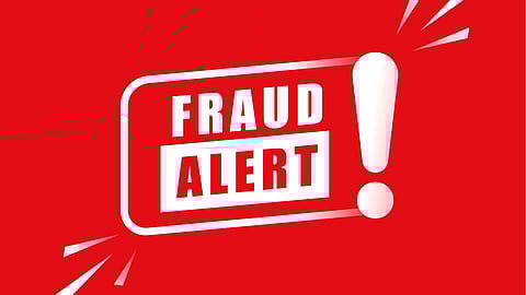 Fraud alert written with white letters in red background.