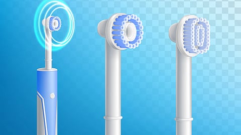 Three electric toothbrushes and one in its working condition. 