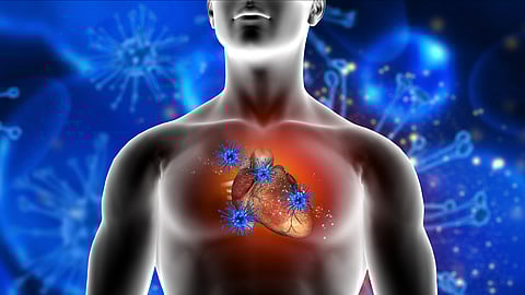 A silhouette of a human torso with a glowing red heart surrounded by blue virus-like structures.