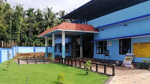 A CHC building in Kerala with green lawn in the from OP area. 