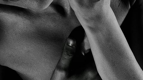 Close-up of a black and white image of a woman's hands.