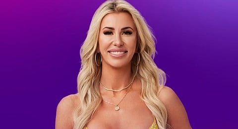 Elissa Finley in a shoulder less dress.