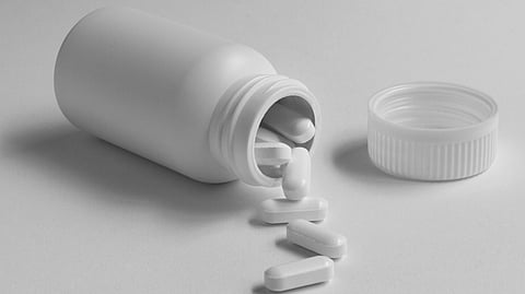 Pill box with pills.