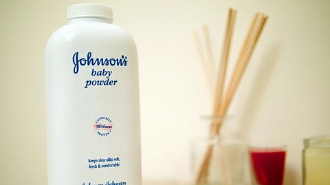 Johnson's baby powder bottle in white.