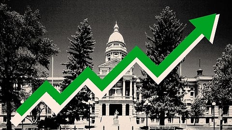 Black and white image of a historic building with a green upward-trending arrow overlay.