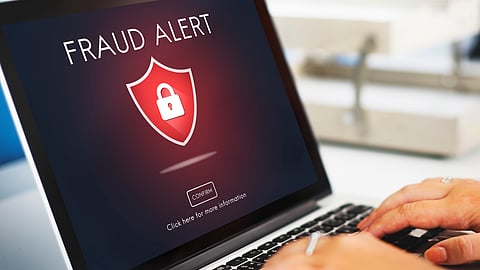 Fraud Alert appearing on a laptop screen. 