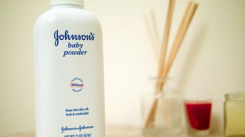 Johnson's Baby Powder container with a white label and blue accents.