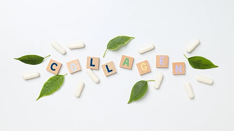 Inscription collagen on wooden cubes with leaves and pills