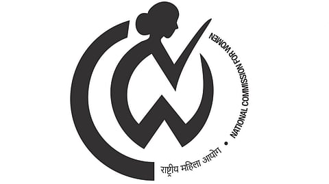 Logo of the National Commission for Women showing a woman’s profile with the letters “NCW.”