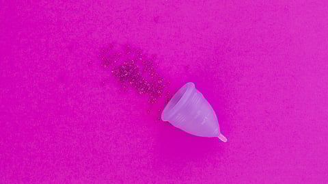 Menstrual cup with glitter