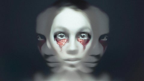 Photographic art print of a face with white makeup and red glittery tears.