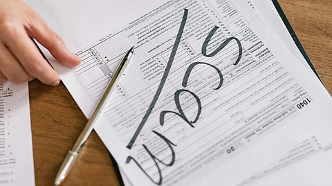 Scam written on a paper