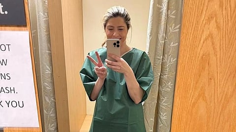 McKinnon Galloway, wearing OT dress, posing for a selfie.