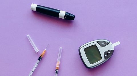 Diabetes care tools like a glucose meter and insulin help manage daily health.