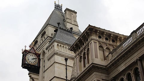 The top of the Royal Courts of Justice, commonly called the Law Courts in London. Clock is visible. 