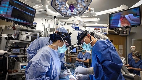 Dr. Guy Slonimsky and Dr. Alyssa Givens, along with their team, conduct a Genio implant surgery to treat obstructive sleep apnea.