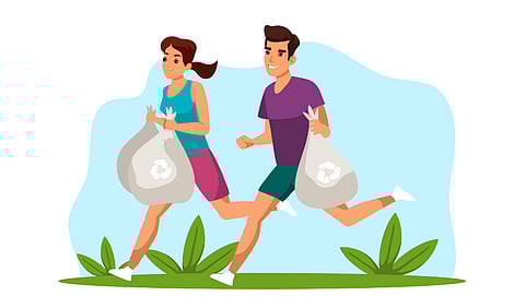 Eco friendly woman and man jogging holding trash bags couple pick up waste for recycling ecological protection