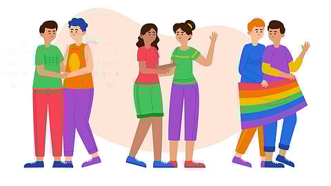 Three diverse couples smiling and holding each other, with one couple wrapped in a rainbow flag showing LGBTQ+ pride.