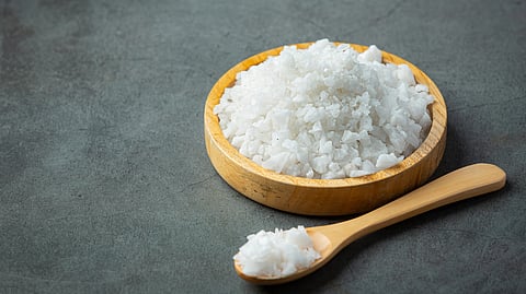 Salt in wooden small plate
