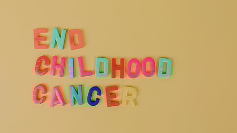End childhood cancer in rainbow letters.