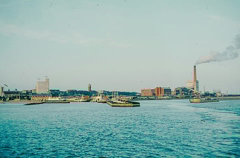 Industrial emissions are rising from a coal processing plant in Pennsylvania, causing pollution.