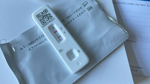 a medical device sitting on top of a piece of paper