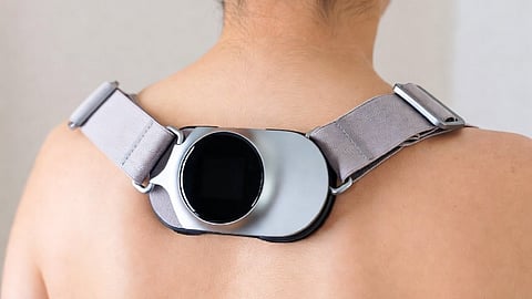 Smart posture tracker on back.