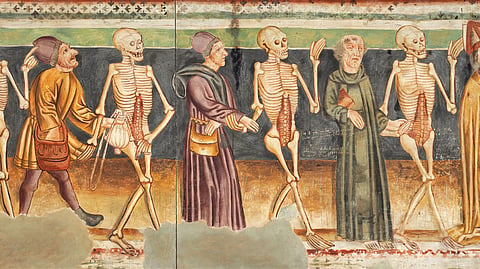 A medieval fresco showing skeletons and living people in a Dance of Death procession.