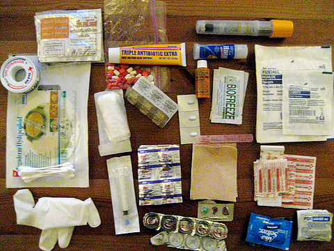 An unpacked first aid kit
