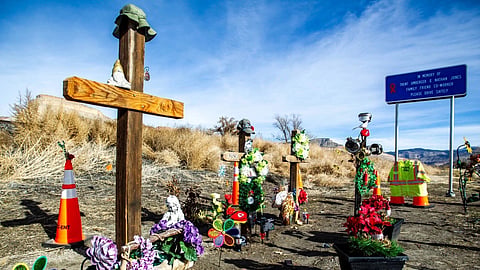 Memorial marker at a Colorado crash site where two transportation workers were killed in a drug-impaired driving incident.