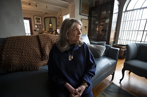 Vaccine advocate and former polio patient Carol Boigon sits in her living room in Denver during an interview about public trust in vaccines and changing federal health policies.